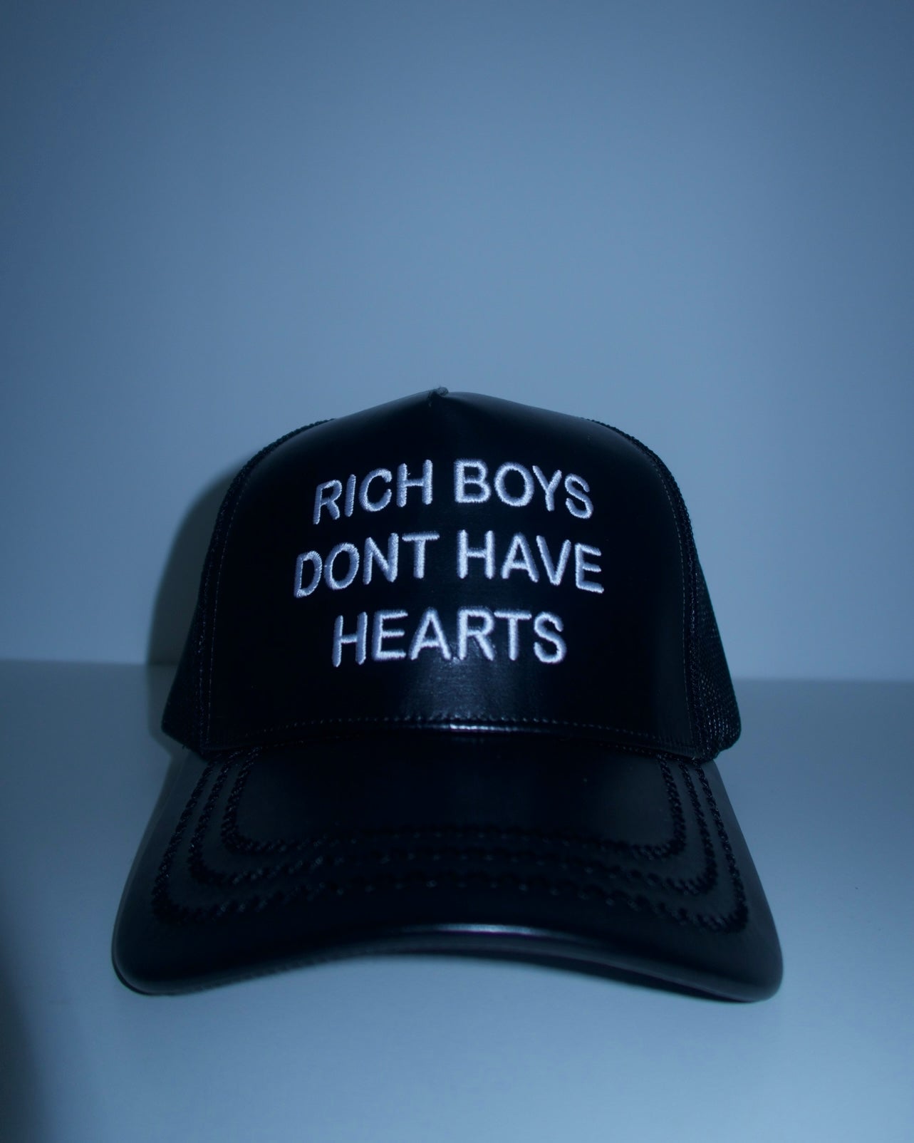 Black Leather Rich Boys Dont Have Hearts TRUCKER HAT